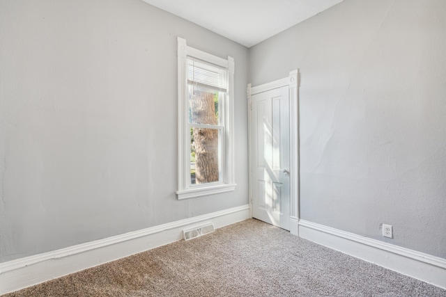 spare room with carpet flooring