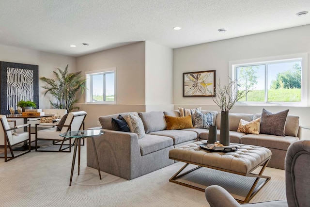 10291 Shadyview Ln N, Maple Grove, MN 55311 - living room with a textured ceiling, recessed lighting, and light carpet
