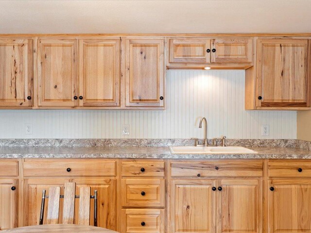 kitchen with sink and light brown cabinets