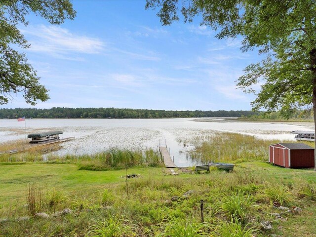 property view of water with a boat dock