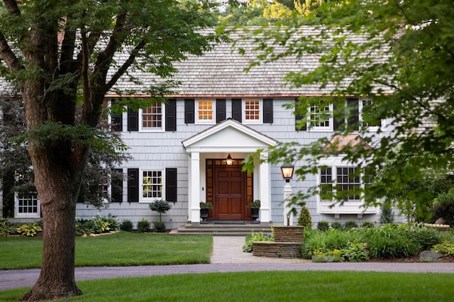 view of front of home with a front yard