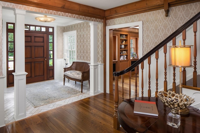 357 Salem Church Rd, Sunfish Lake, MN 55118 - entrance foyer featuring wood-type flooring, decorative columns, and wallpapered walls