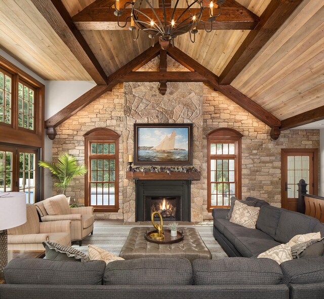357 Salem Church Rd, Sunfish Lake, MN 55118 - living area with wooden ceiling, a fireplace, beam ceiling, and a notable chandelier