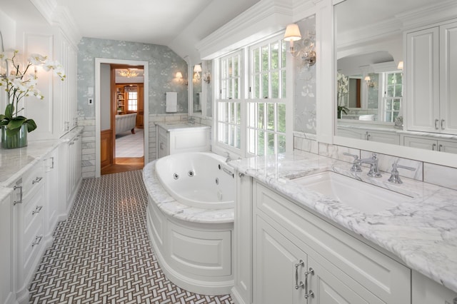 357 Salem Church Rd, Sunfish Lake, MN 55118 - bathroom with plenty of natural light, vanity, a tub with jets, and wallpapered walls