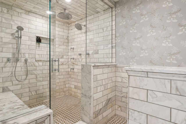 357 Salem Church Rd, Sunfish Lake, MN 55118 - bathroom with wainscoting, a tile shower, and wallpapered walls