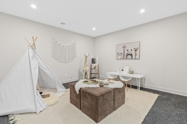 sitting room with carpet flooring