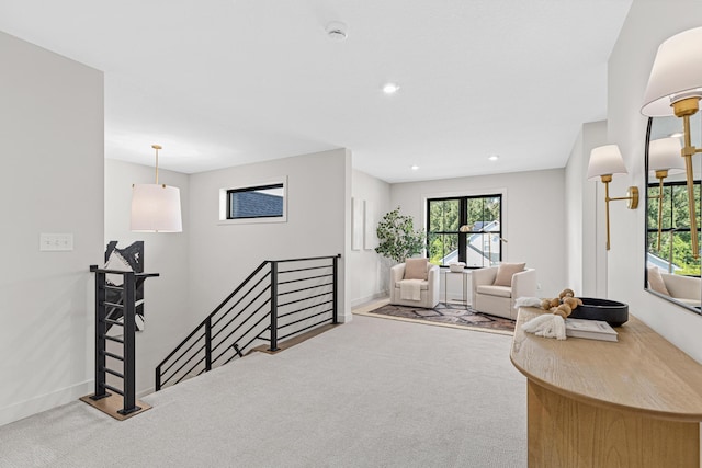 living area with carpet