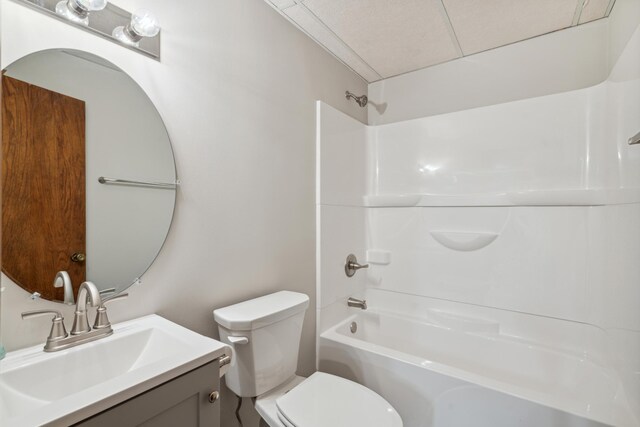 full bathroom featuring vanity, toilet, and washtub / shower combination