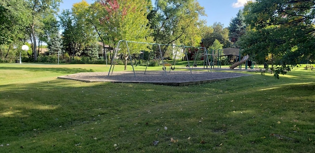 view of community with a playground and a yard