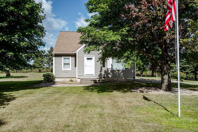 view of front of home with a front yard