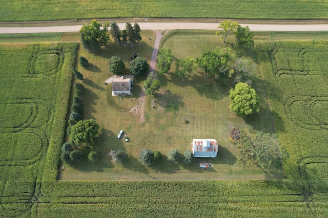 birds eye view of property with a rural view