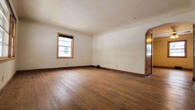 spare room featuring hardwood / wood-style flooring and ceiling fan