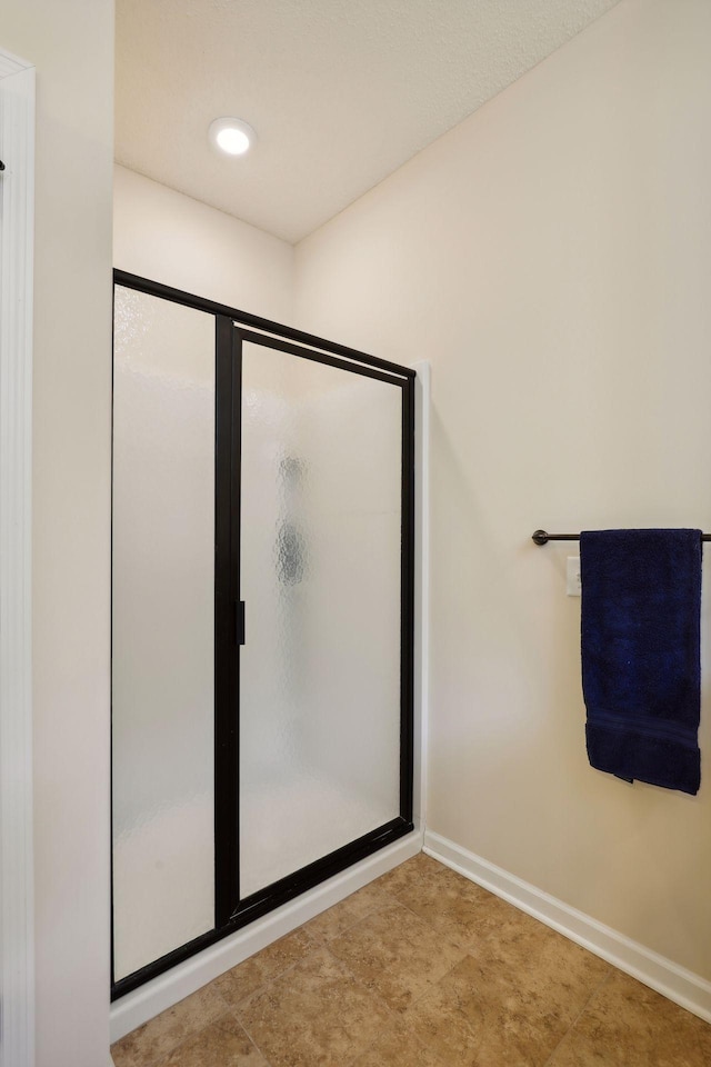 bathroom featuring walk in shower