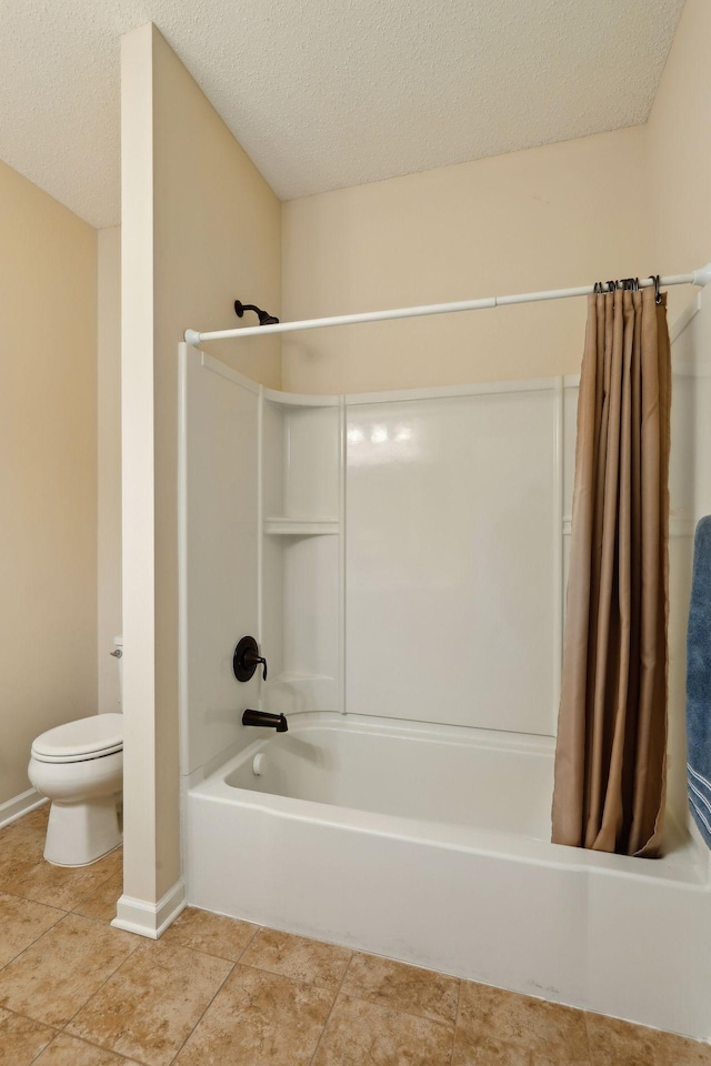 bathroom with shower / bathtub combination with curtain, a textured ceiling, and toilet