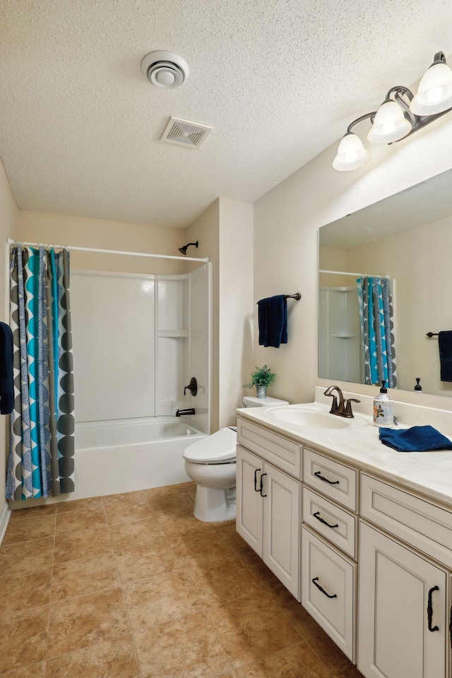 full bathroom featuring shower / bath combination with curtain, toilet, a textured ceiling, and vanity