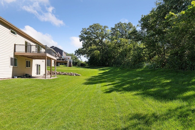 view of yard featuring a deck