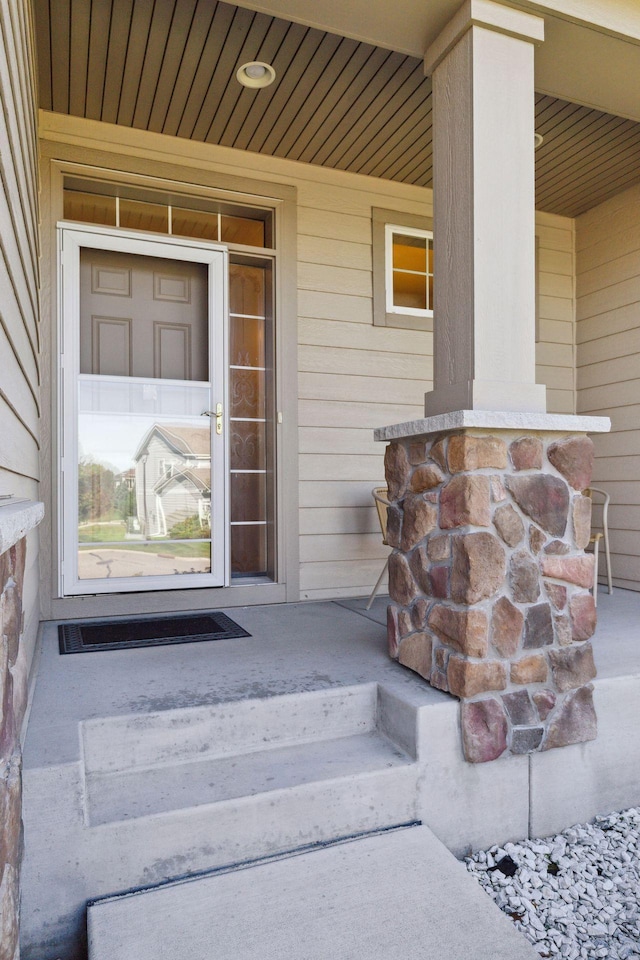 doorway to property featuring a porch