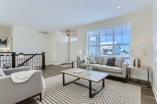 living room with dark wood-type flooring