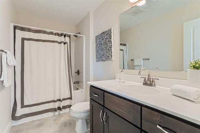 full bathroom with vanity, toilet, and shower / bath combo with shower curtain