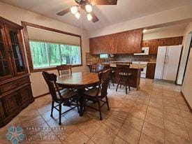 dining room with light tile patterned flooring and ceiling fan