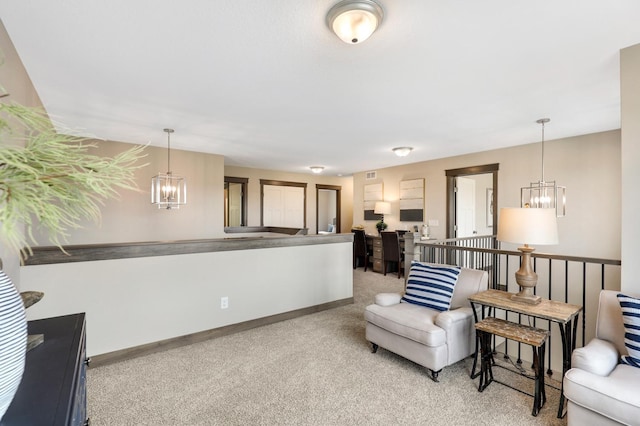 interior space featuring light colored carpet and a notable chandelier