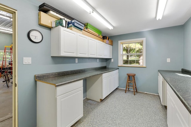 kitchen with white cabinets