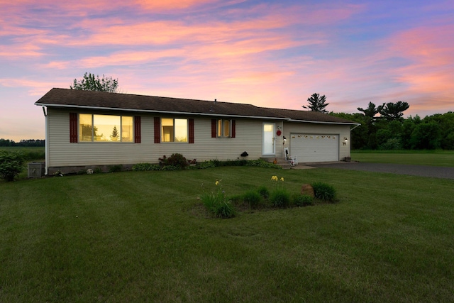 7702 County Road 5 NE, North Branch, MN 55056 - single story home featuring asphalt driveway, an attached garage, and a yard