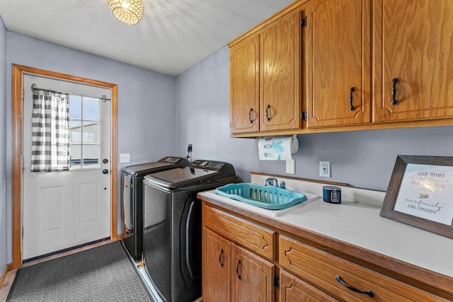 7702 County Road 5 NE, North Branch, MN 55056 - washroom with washing machine and dryer and cabinet space