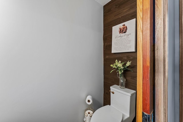 7702 County Road 5 NE, North Branch, MN 55056 - bathroom featuring toilet and wood walls