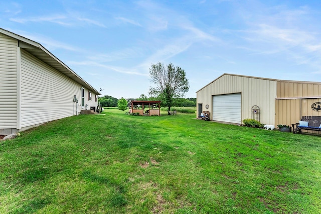 7702 County Road 5 NE, North Branch, MN 55056 - view of grassy yard with a garage, an outbuilding, a pole building, and driveway