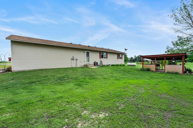 7702 County Road 5 NE, North Branch, MN 55056 - rear view of house with a lawn