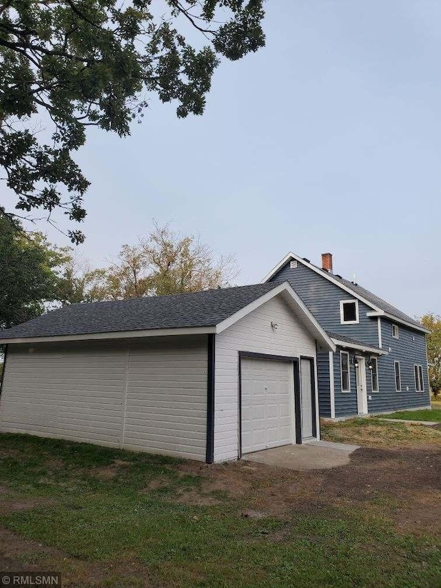 exterior space featuring a garage