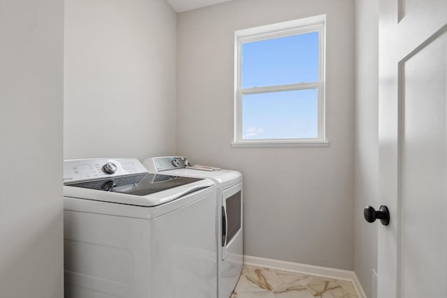 laundry room featuring washing machine and dryer