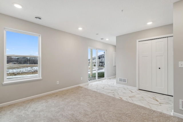 view of carpeted spare room