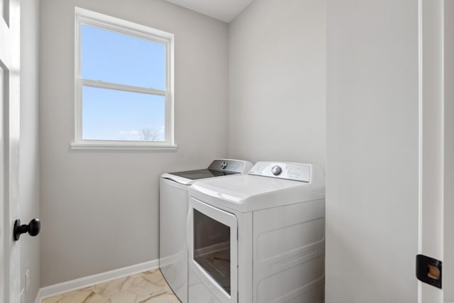 laundry area with washer and clothes dryer