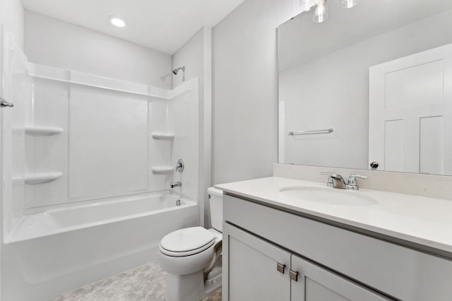 full bathroom with bathtub / shower combination, vanity, and toilet