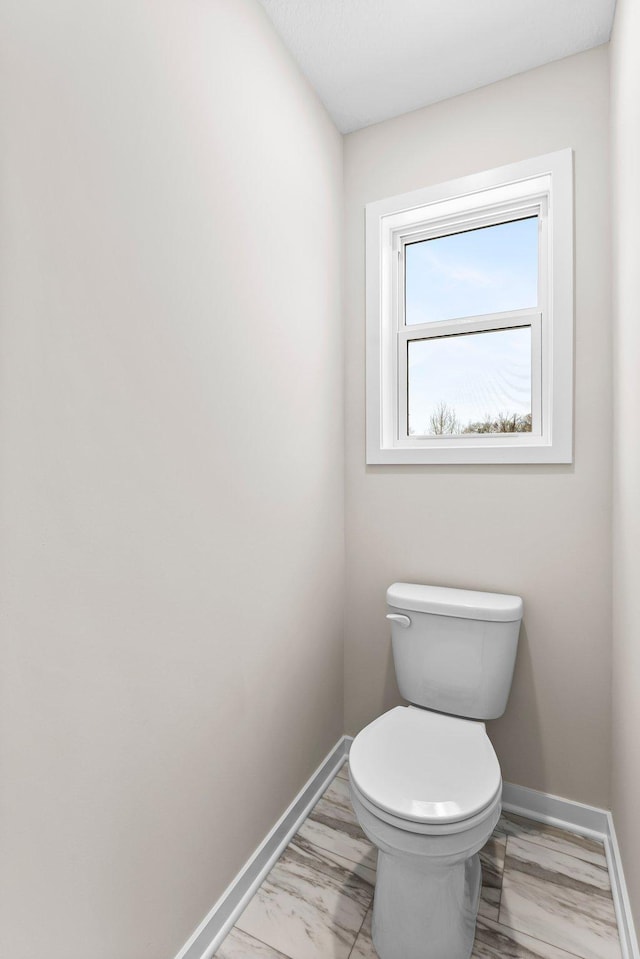 bathroom featuring toilet