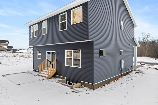 view of snow covered property