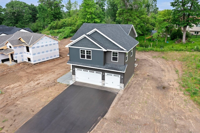 19498 Carson Ct NW, Elk River, MN 55330 - view of front of home with a garage and driveway
