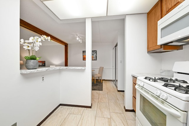 kitchen featuring white appliances