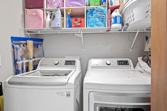 clothes washing area with laundry area and washing machine and dryer