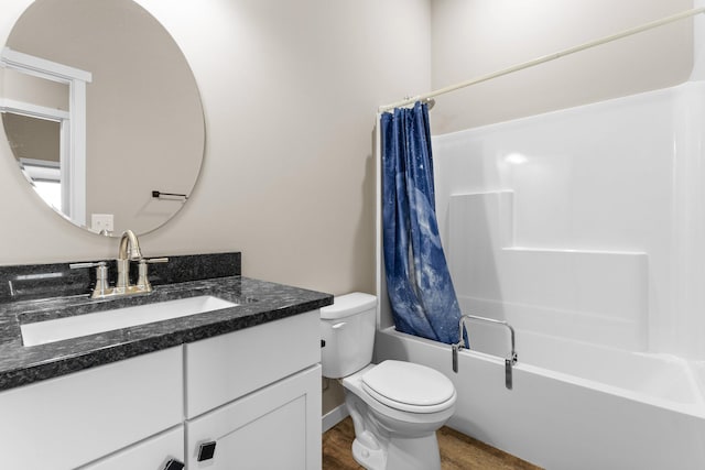 full bathroom featuring vanity, toilet, shower / tub combo, and hardwood / wood-style floors