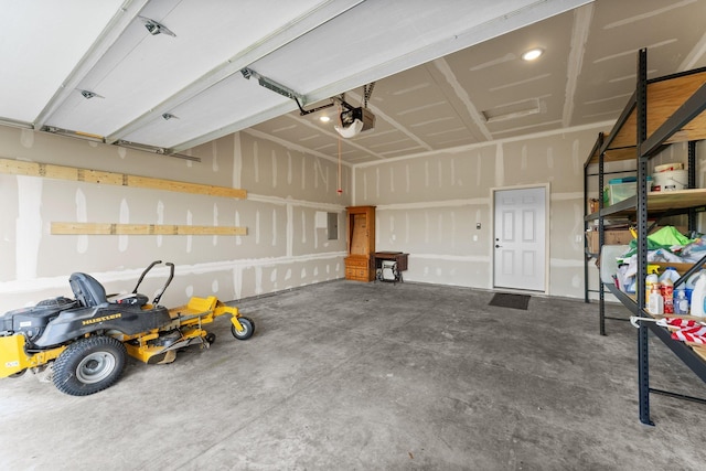 garage featuring a garage door opener