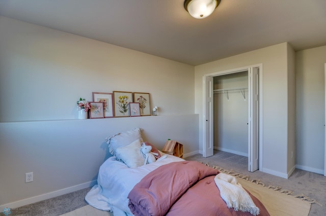 bedroom with light colored carpet and a closet