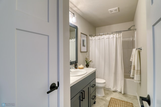 full bathroom featuring vanity, toilet, and shower / tub combo with curtain