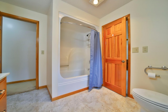 full bathroom featuring vanity, shower / bath combination with curtain, toilet, and baseboards