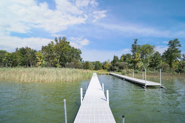 view of dock with a water view