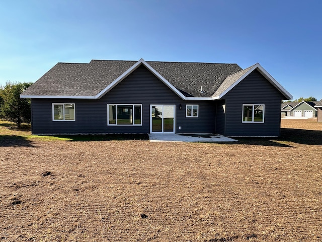 rear view of house featuring a patio area