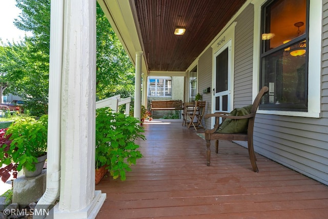 wooden terrace with covered porch