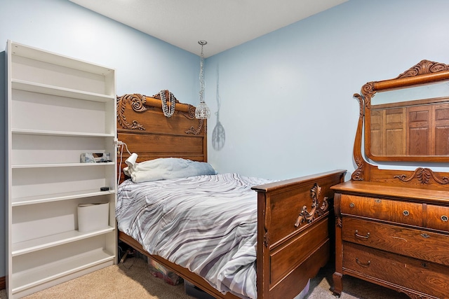 bedroom with light carpet